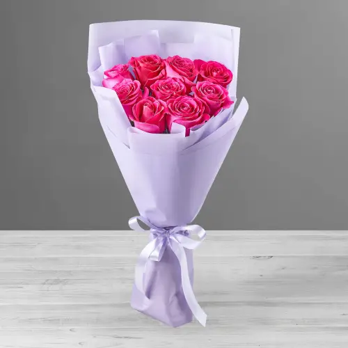 Букет из 9 розовых роз в упаковке